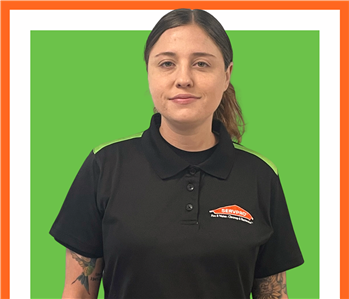 Stephanie, servpro employee against a green background, woman